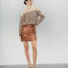 Falda mini metalizada Bella