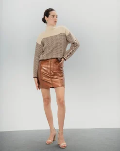 Falda mini metalizada Bella