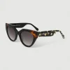 Gafa con tendencia a cat eye negra, habana y estampado