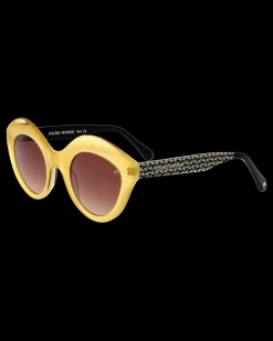 Gafa con tendencia a cat eye mostaza con estampado de hojas